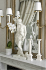 Love the color scheme, love the statue, love the sconces, all of it.